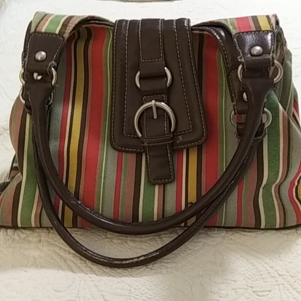 Women St. John's Bay hand purse canvas with faux leather trim gently used.